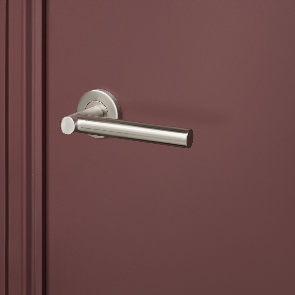 Grosetto_rvs_rond_rozet_bordeaux_deur