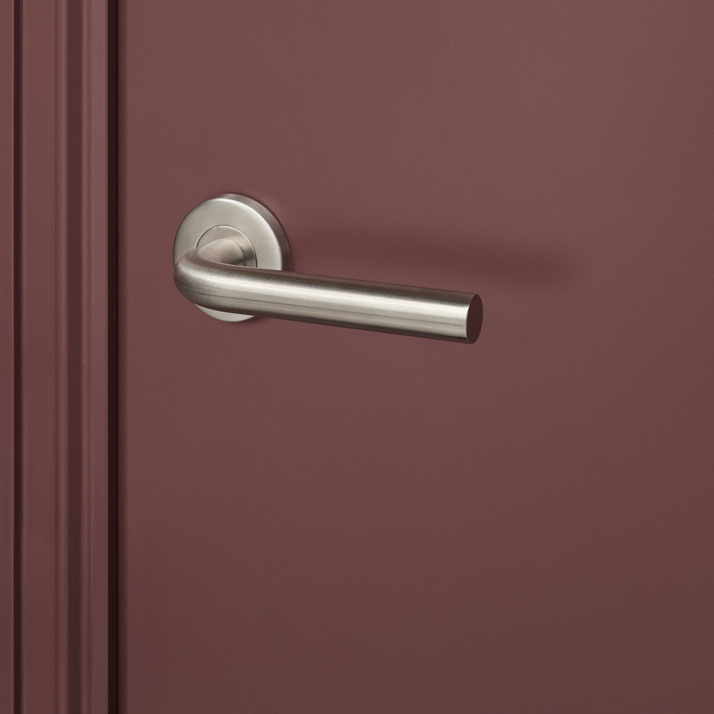 Oristano_rvs_rond_rozet_bordeaux_deur