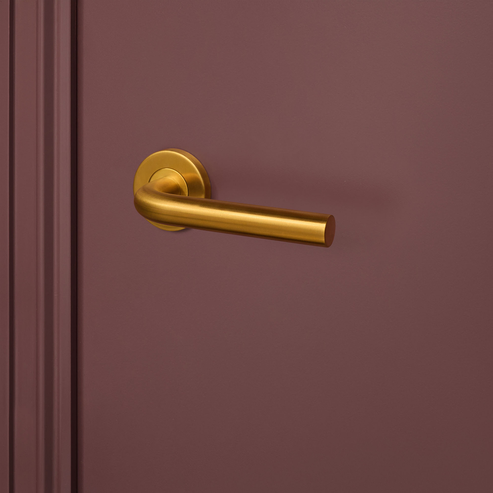 Oristano_goud_rond_rozet_bordeaux_deur