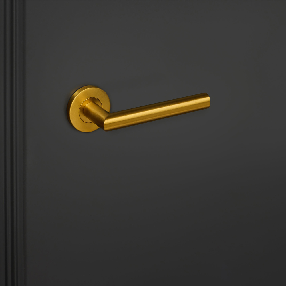 Mantua_goud_rond_rozet_zwarte_deur