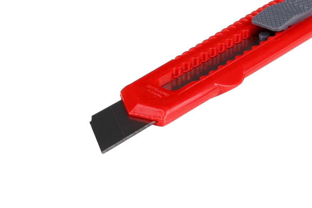 Handigafbreekmesjecloseupuitgeschoven