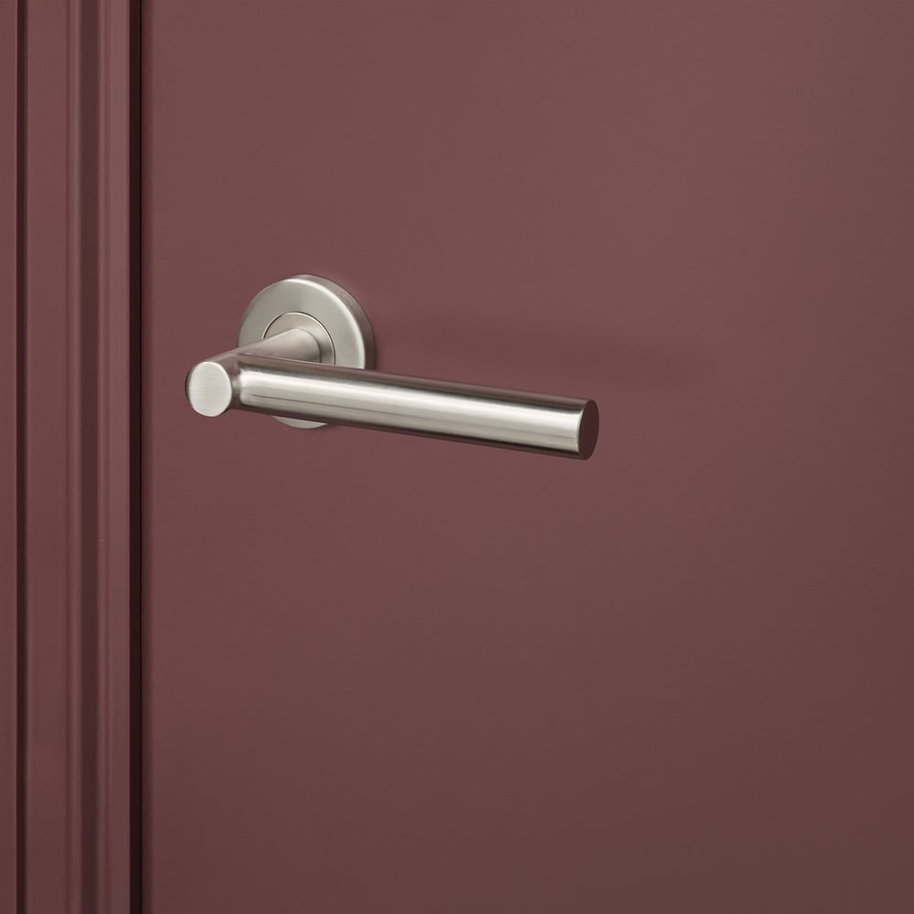 Grosetto_rvs_rond_rozet_bordeaux_deur