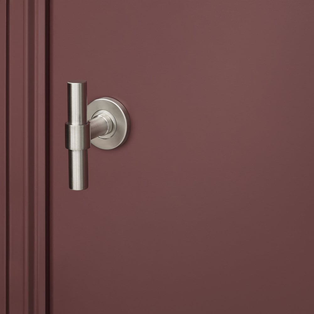 Pesaro_rvs_rond_rozet_bordeaux_deur